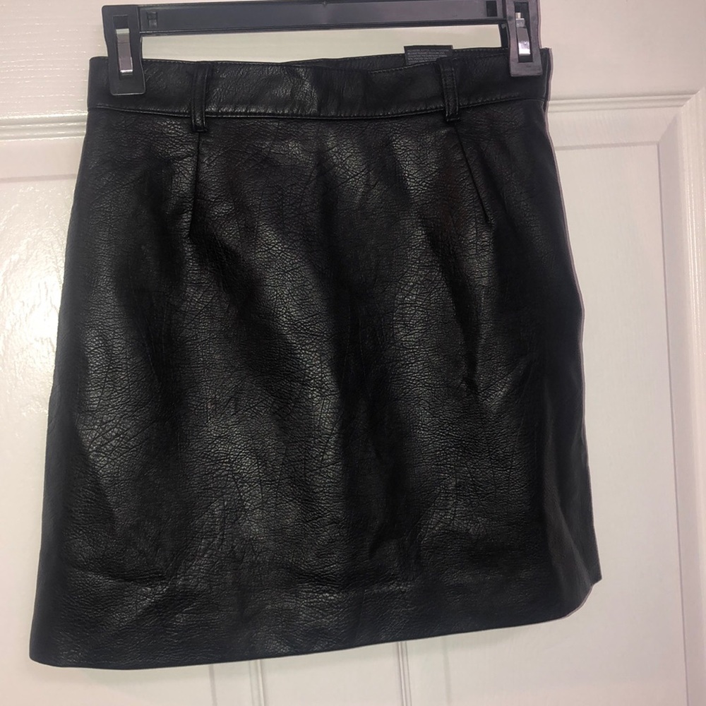 Divided faux leather mini skirt gently used size 2
